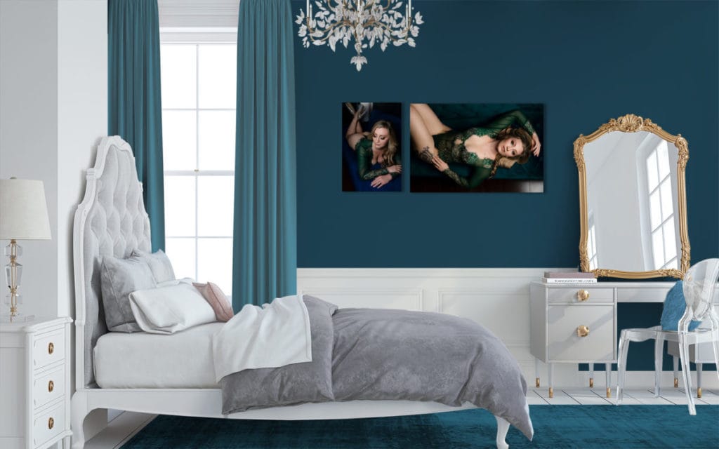 large wall art in bedroom showing boudoir client posing in lingerie